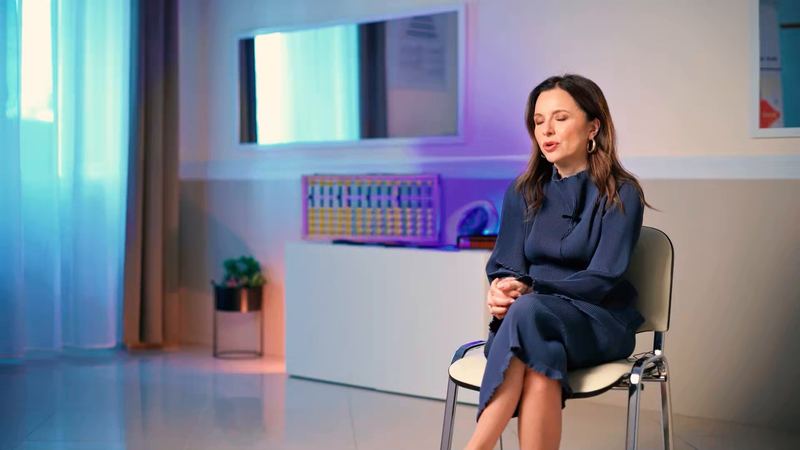 Interview with Hungarian singer Zséda (Adrienn Zsédenyi) on a softly lit set