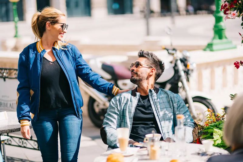 Man and a Woman in Jackets, looking at each other - Lifestyle Product Photography by Novkov Visuals