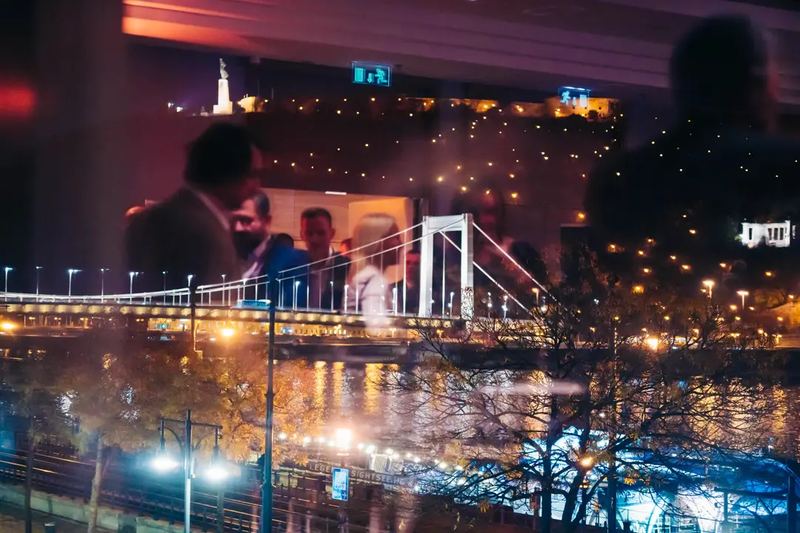 Abstract photography. Combination of business gala event and Budapest Cityscape in nighttime