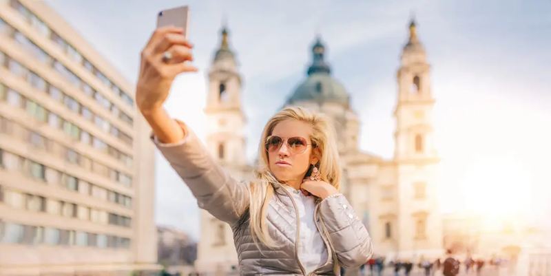 A lady taking selfie at the St Stephen Basilica in Budapest