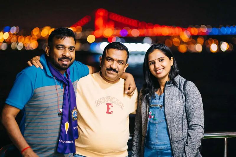 Indian businessmen and a businesswoman at a boat cruising party in Istanbul