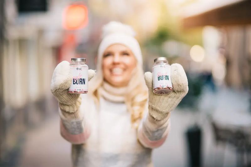A happy consumer showing products