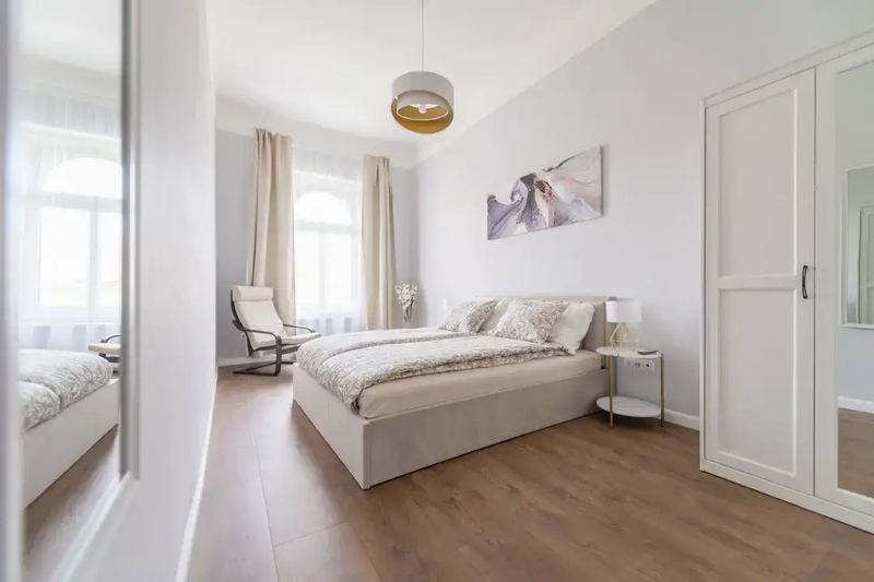 Cozy bedroom shot on natural light by interior photographer and videographer Budapest