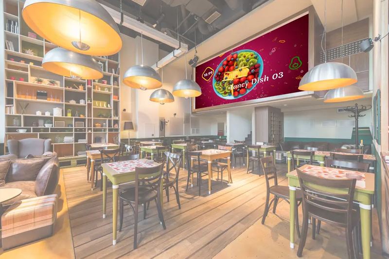 Restaurant with a video menu on the wall screen